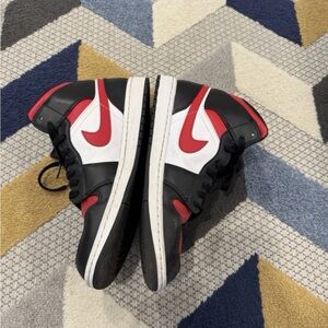 Kids Black and Red Nike Shoes